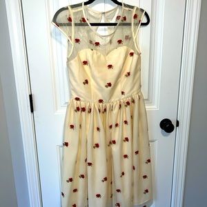 Ivory dress with red roses